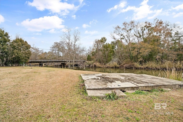 view of yard with a water view