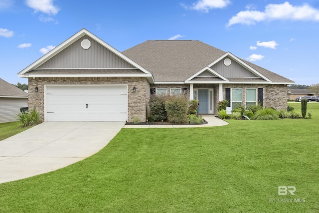 view of front of home featuring a garage and a front lawn