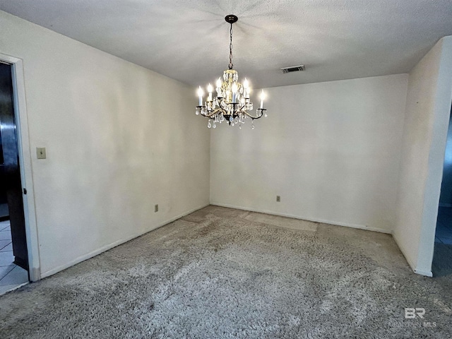 unfurnished dining area with a chandelier, carpet, and baseboards