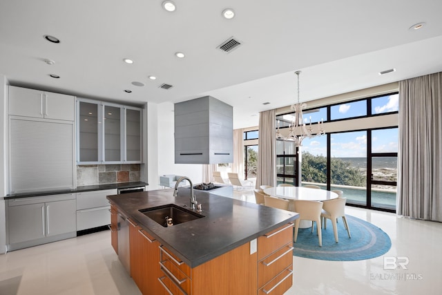 7276 Kiva Way, Gulf Shores, AL 36542 - kitchen with a sink, dark countertops, modern cabinets, decorative backsplash, and recessed lighting