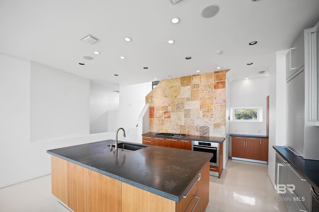 7276 Kiva Way, Gulf Shores, AL 36542 - kitchen with a sink, stainless steel appliances, recessed lighting, backsplash, and a kitchen island with sink