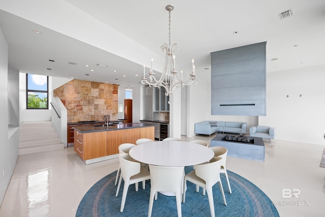 7276 Kiva Way, Gulf Shores, AL 36542 - dining space with a chandelier, recessed lighting, and beverage cooler