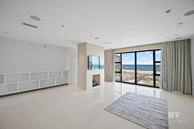 7276 Kiva Way, Gulf Shores, AL 36542 - unfurnished living room featuring a fireplace and recessed lighting