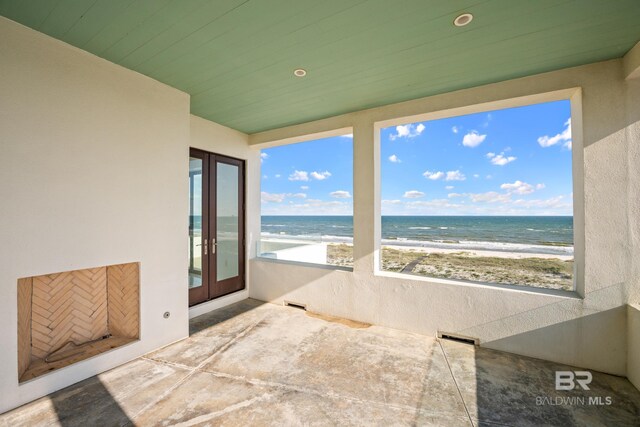 7276 Kiva Way, Gulf Shores, AL 36542 - view of patio / terrace featuring french doors and view of water and beach