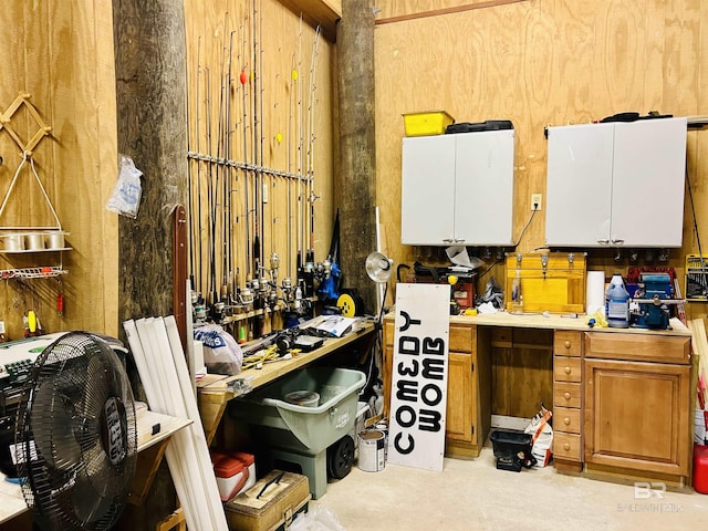 misc room with a workshop area