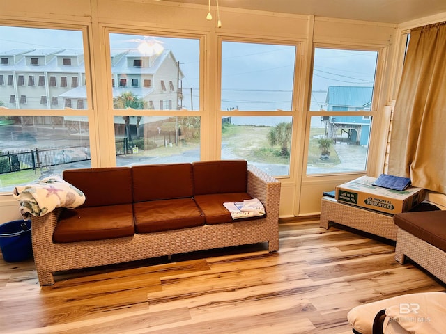 sunroom / solarium with wood finished floors