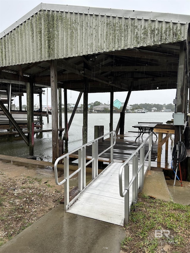 dock featuring a water view and boat lift