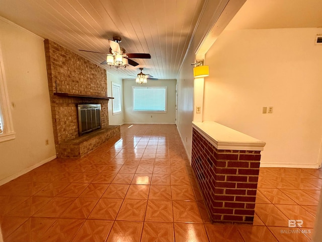 403 Sutherland Dr, Chickasaw, AL 36611 - unfurnished living room featuring light tile patterned floors, wood ceiling, a ceiling fan, a brick fireplace, and baseboards
