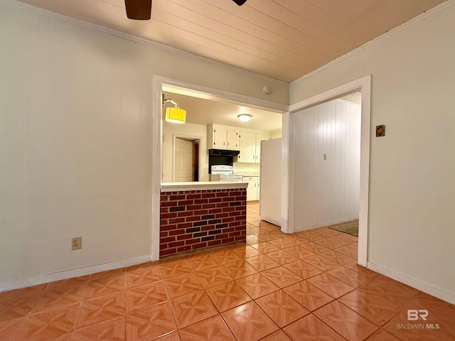 403 Sutherland Dr, Chickasaw, AL 36611 - unfurnished living room with crown molding and baseboards