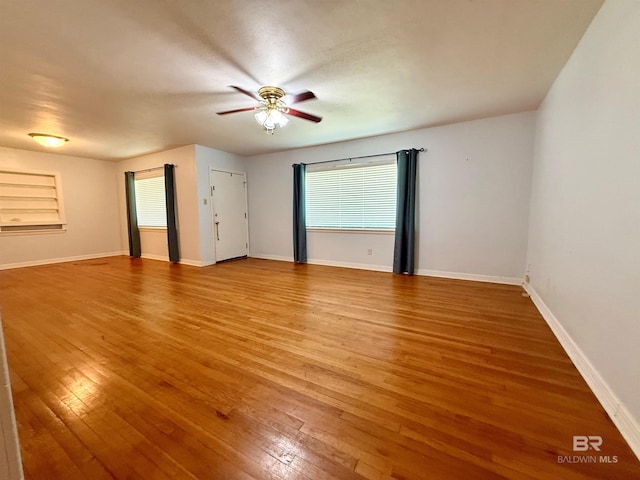 403 Sutherland Dr, Chickasaw, AL 36611 - empty room featuring ceiling fan, light wood-style flooring, and baseboards