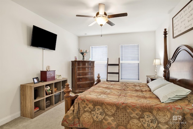 bedroom with ceiling fan and carpet