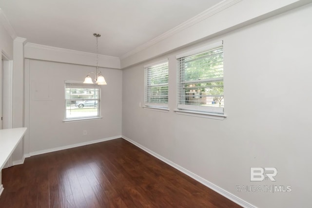 2105 Upham Pl, Mobile, AL 36607 - unfurnished dining area with a chandelier, ornamental molding, healthy amount of natural light, dark wood finished floors, and baseboards