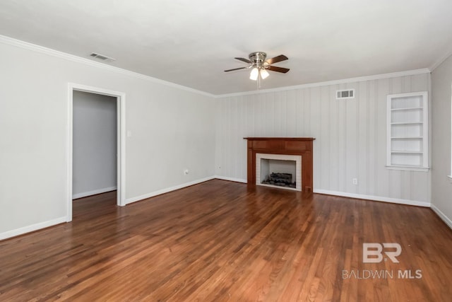 2105 Upham Pl, Mobile, AL 36607 - unfurnished living room featuring a ceiling fan, ornamental molding, a fireplace, wood finished floors, and baseboards