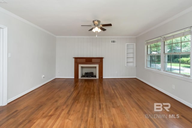 2105 Upham Pl, Mobile, AL 36607 - unfurnished living room with crown molding, a ceiling fan, baseboards, a fireplace, and wood finished floors