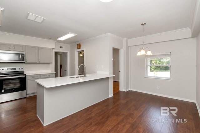 2105 Upham Pl, Mobile, AL 36607 - kitchen with stainless steel appliances, gray cabinets, a sink, dark wood-style floors, and ornamental molding