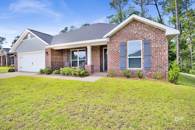 22894 Ridgewood Dr, Robertsdale, AL 36567 - ranch-style home with brick siding, a garage, a front lawn, board and batten siding, and concrete driveway