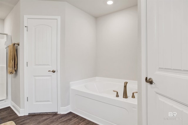 22894 Ridgewood Dr, Robertsdale, AL 36567 - full bath with a bath, wood finished floors, baseboards, a stall shower, and recessed lighting