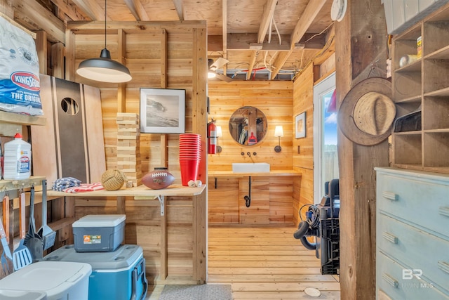 486 E Bernard Ct, Gulf Shores, AL 36542 - interior space featuring wood walls and hardwood / wood-style flooring