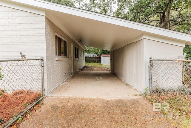 view of parking / parking lot featuring a carport