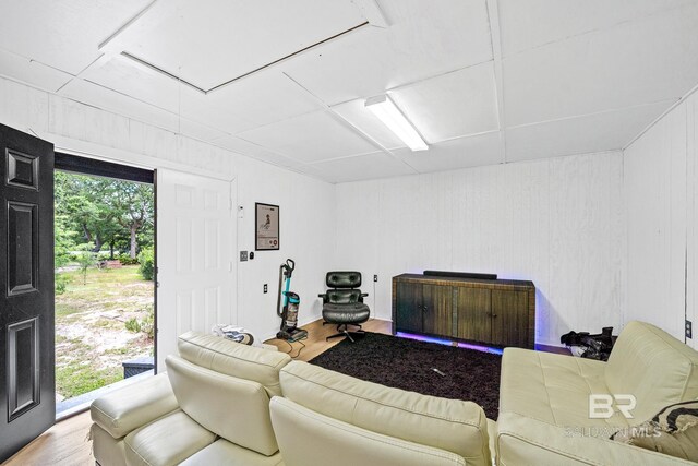 living room featuring light wood-type flooring and a wealth of natural light