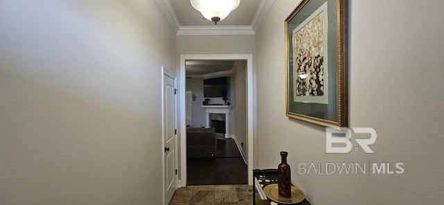 hall with hardwood / wood-style floors and ornamental molding