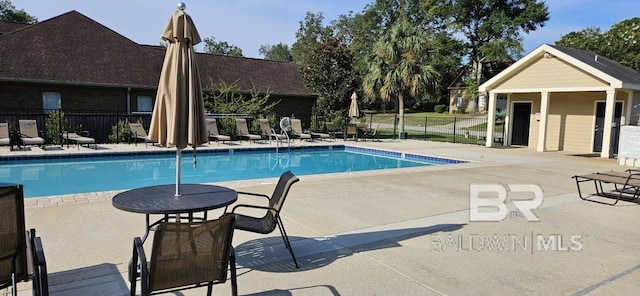 view of pool featuring a patio