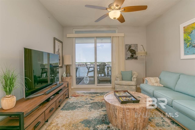 living area featuring a ceiling fan