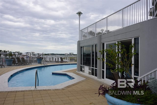 pool featuring a patio