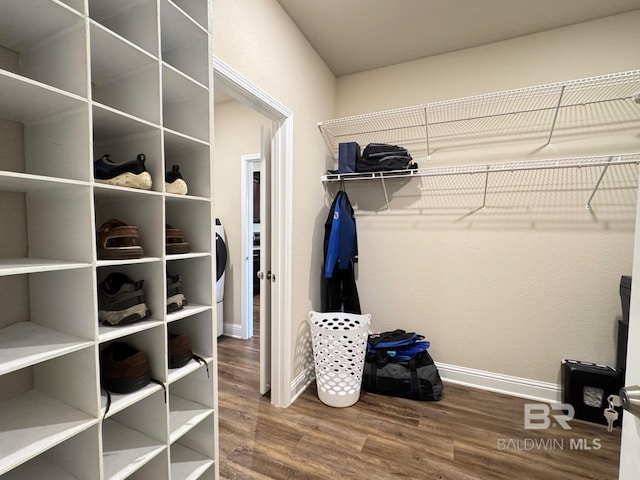 spacious closet featuring hardwood / wood-style flooring