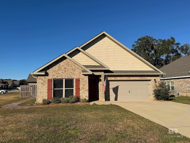 view of front facade featuring a garage and a front lawn