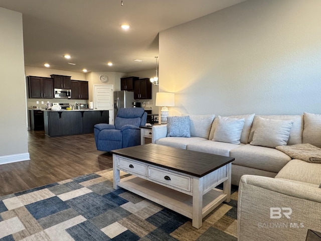 living room featuring dark hardwood / wood-style floors