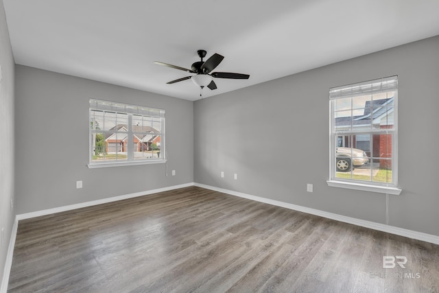 24477 Harvester Dr, Loxley, AL 36551 - spare room featuring baseboards, a ceiling fan, and wood finished floors