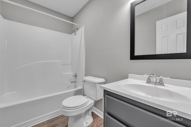 24477 Harvester Dr, Loxley, AL 36551 - full bathroom featuring vanity, shower / tub combination, wood finished floors, and toilet