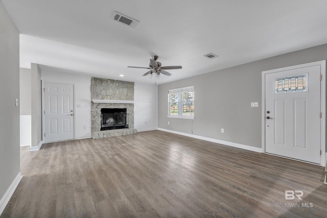 24477 Harvester Dr, Loxley, AL 36551 - unfurnished living room with visible vents, a ceiling fan, and baseboards