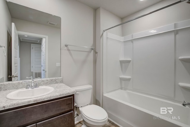 full bathroom featuring vanity, toilet, and tub / shower combination