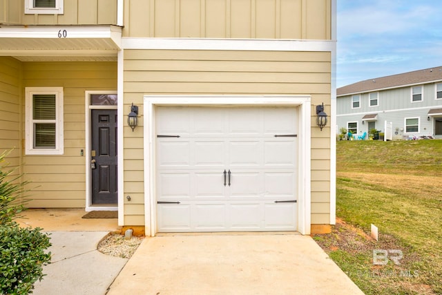 garage featuring a yard