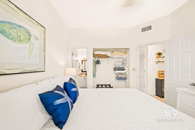 bedroom featuring visible vents