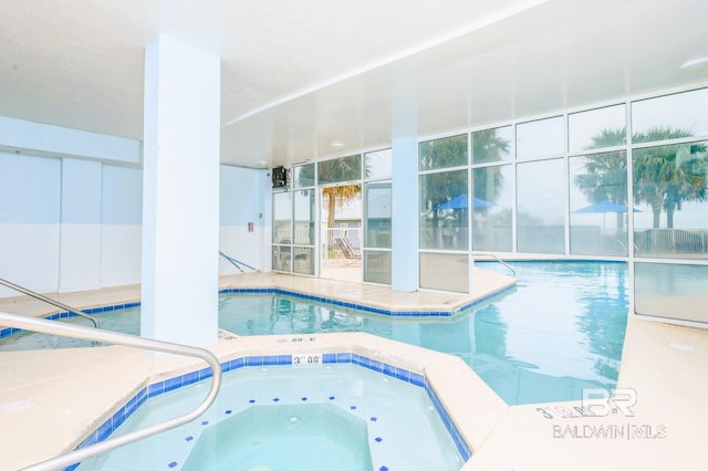 pool featuring an indoor hot tub