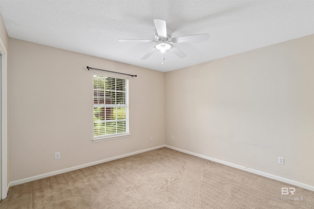 25779 Austin Rd, Daphne, AL 36526 - carpeted spare room with baseboards, a ceiling fan, and a textured ceiling