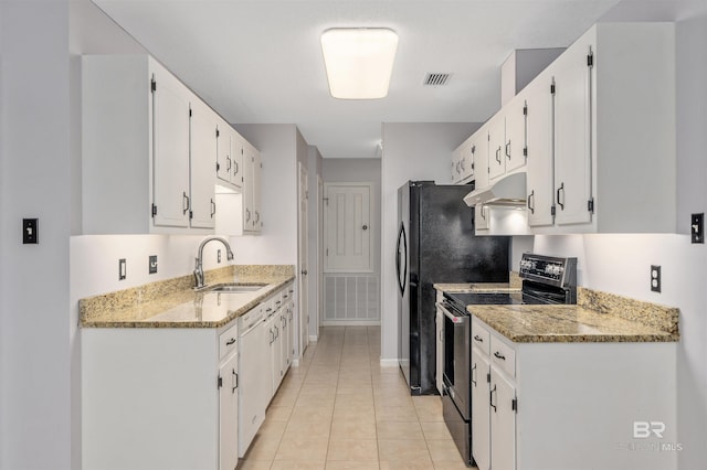 25779 Austin Rd, Daphne, AL 36526 - kitchen with stainless steel range with electric stovetop, a sink, under cabinet range hood, white cabinets, and light tile patterned floors