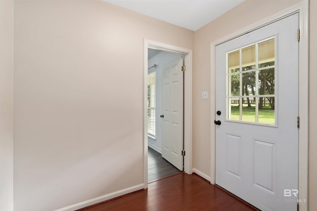 25779 Austin Rd, Daphne, AL 36526 - doorway featuring dark wood-style flooring and baseboards
