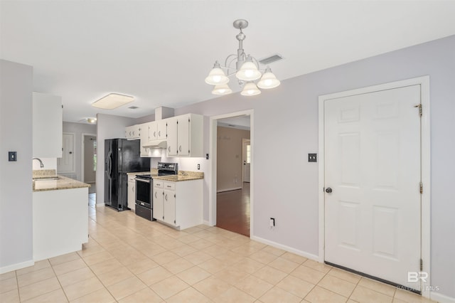 25779 Austin Rd, Daphne, AL 36526 - kitchen with stainless steel electric range, freestanding refrigerator, a chandelier, white cabinetry, and light tile patterned flooring
