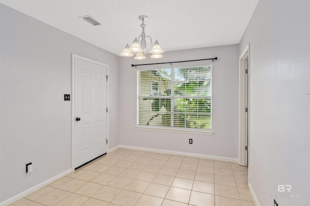 25779 Austin Rd, Daphne, AL 36526 - spare room with a chandelier and baseboards
