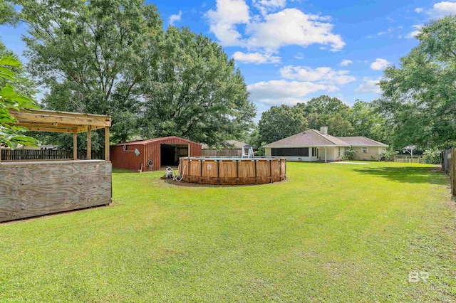 25779 Austin Rd, Daphne, AL 36526 - view of yard featuring an outdoor pool, an outdoor structure, and a pole building