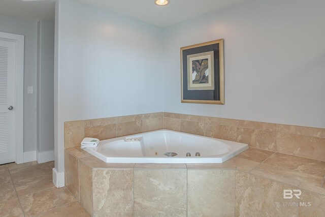 bathroom with tile patterned flooring