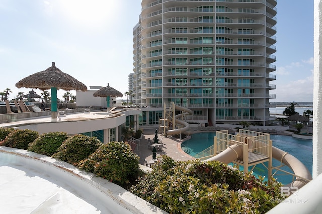 view of pool featuring a water slide