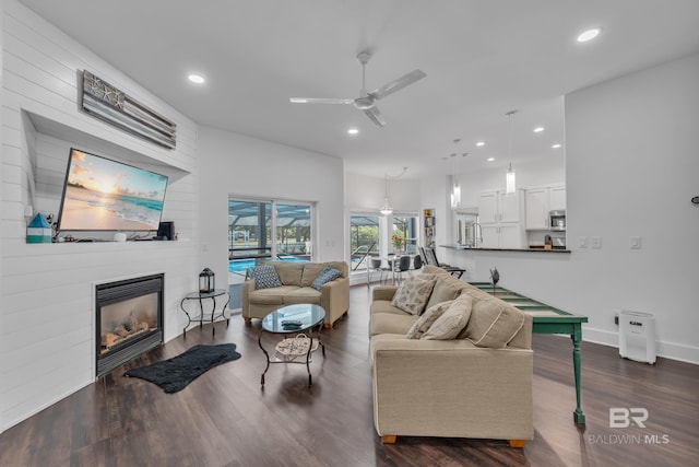 1352 W Fairway Dr, Gulf Shores, AL 36542 - living area with a fireplace, baseboards, ceiling fan, recessed lighting, and dark wood finished floors