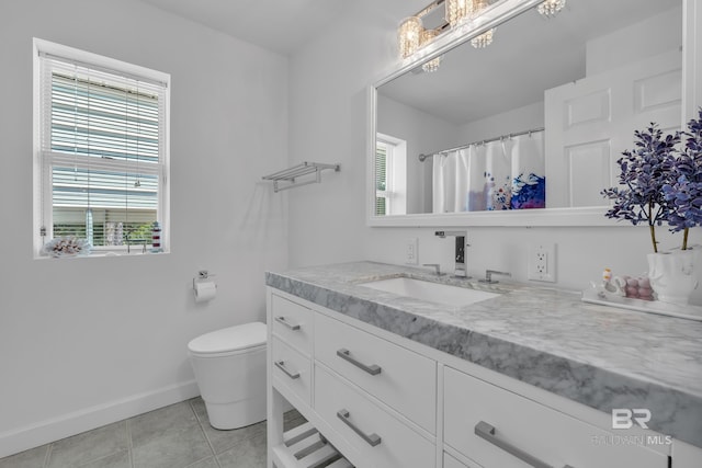 1352 W Fairway Dr, Gulf Shores, AL 36542 - full bathroom with tile patterned flooring, baseboards, vanity, toilet, and an inviting chandelier