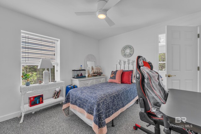 1352 W Fairway Dr, Gulf Shores, AL 36542 - bedroom featuring baseboards, multiple windows, carpet flooring, and ceiling fan