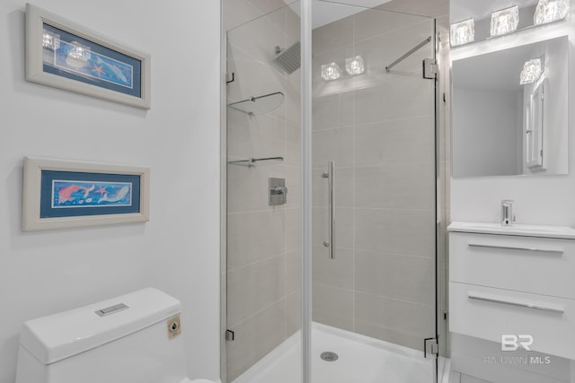 1352 W Fairway Dr, Gulf Shores, AL 36542 - bathroom featuring a sink, a shower stall, and toilet